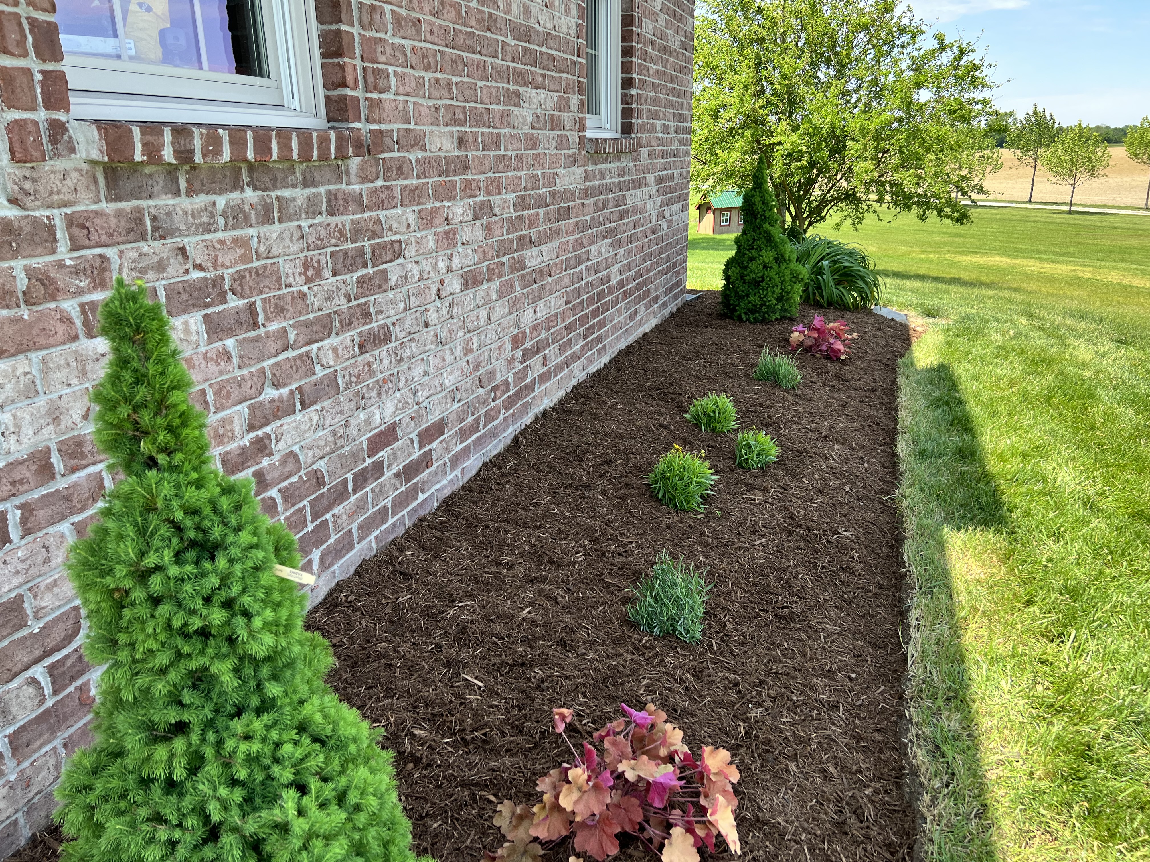 Transform Your Outdoor Space with Expert Landscaping in McCordsville, IN by Normans Lawn Maintenance, LLC